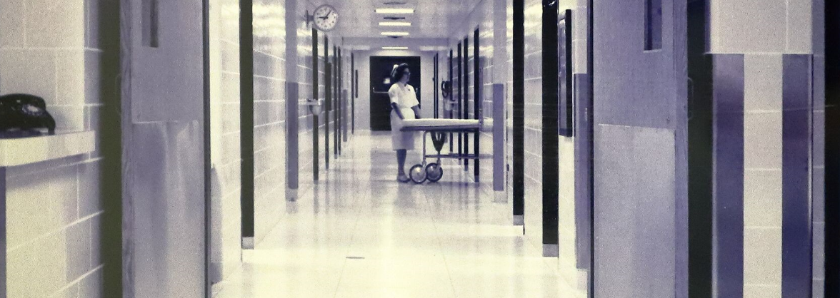 Hospital Hallway with nurse and gurney